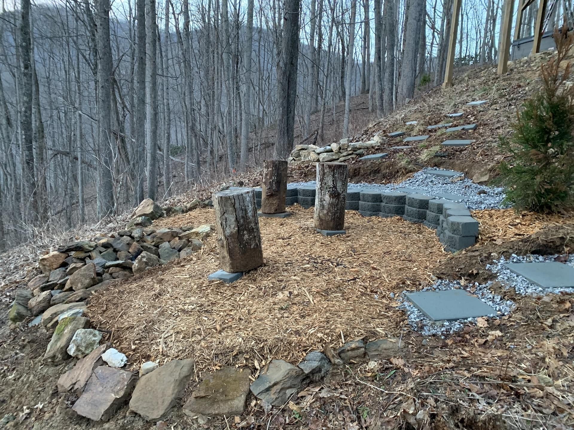 Exterior of areas of Nessi Homes corporate event cabin during sunset in Western North Carolina.
